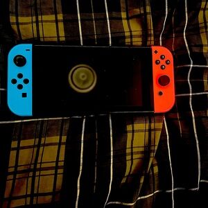 Nintendo’s switch. Comes with charging dock,hdmi,